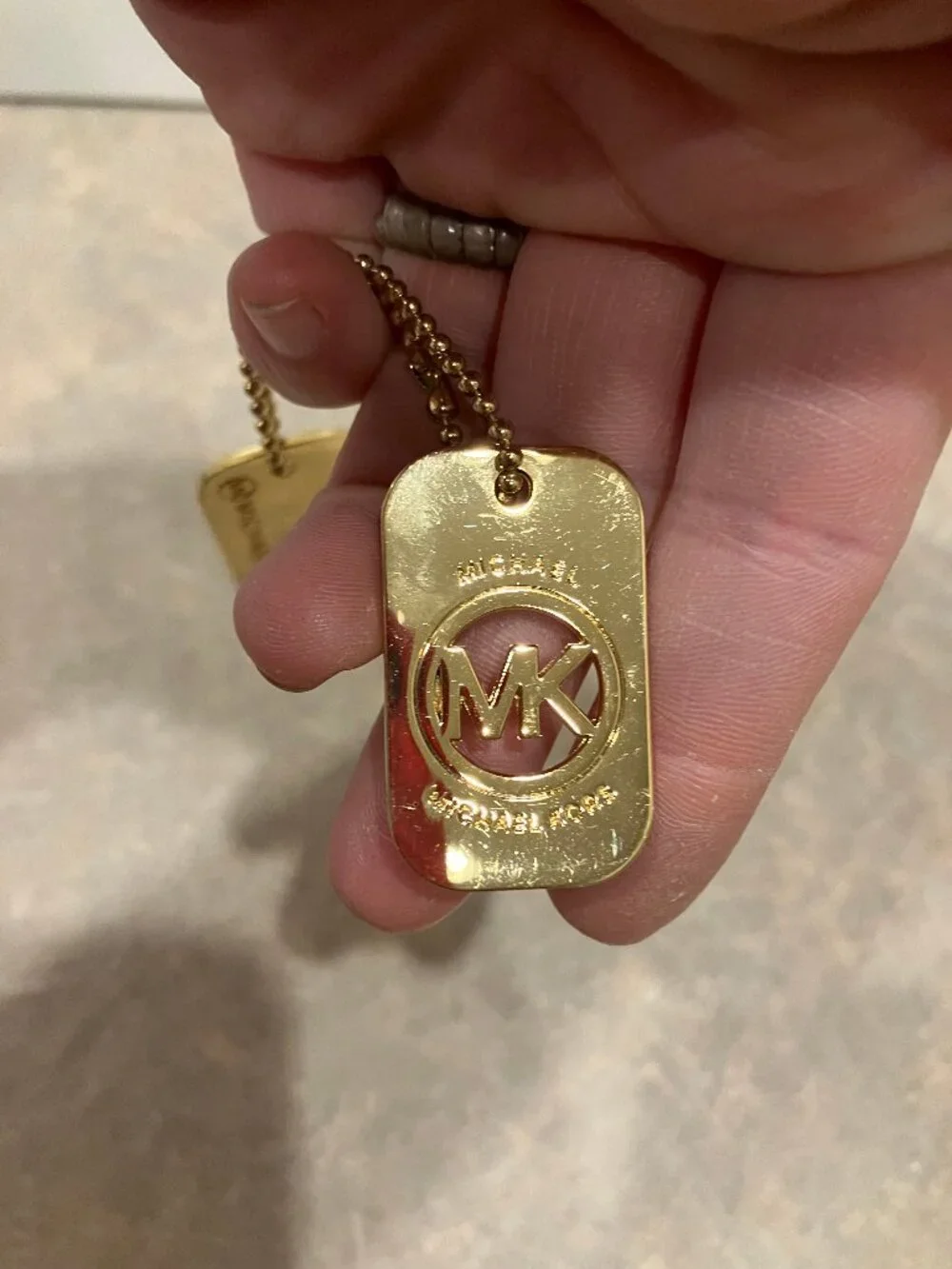 Gold Michael Kors Metal Bag Tag